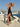 Solid Color Starfish Deep V Backless Tied Halter Skirt Swimwear for Women